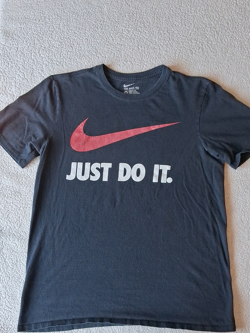 Nike Black T-Shirt with Red Swoosh and White Text